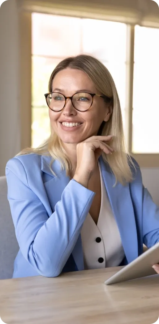A lawyer in a blue blazer smiling